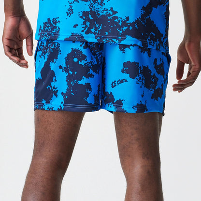 The Male model is wearing Red Bull Racing Graphic Blue Football Shorts 6
