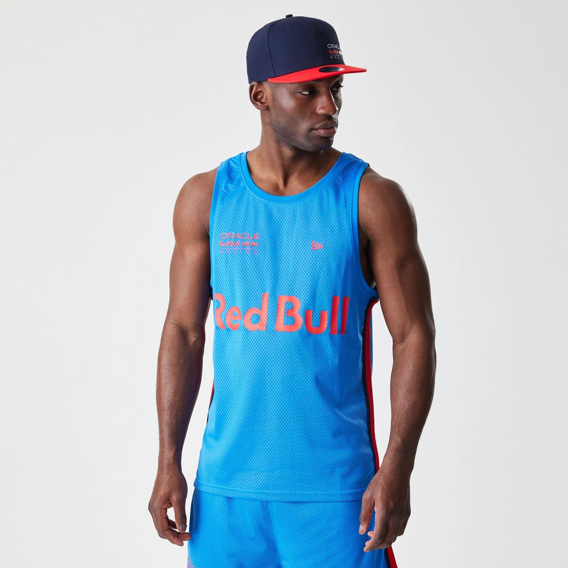 The Male model is wearing Red Bull Racing Basketball Mesh Blue Sleeveless T-Shirt 1