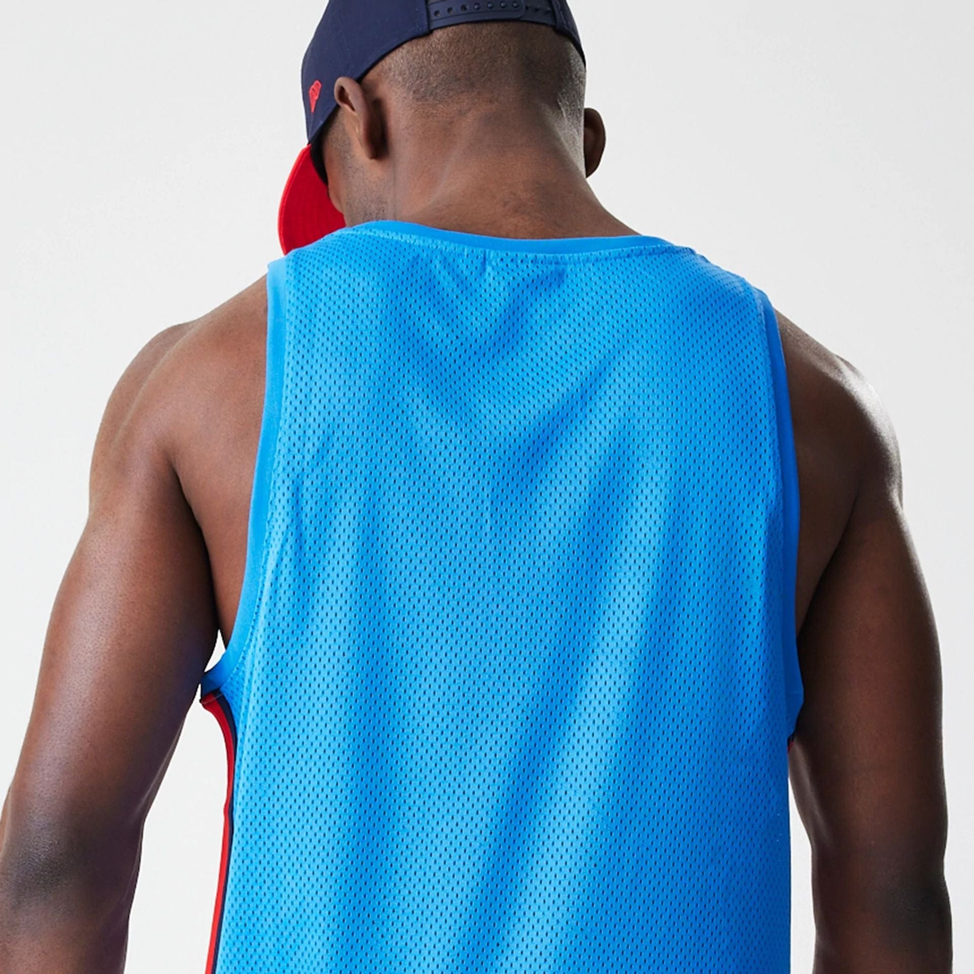 The Male model is wearing Red Bull Racing Basketball Mesh Blue Sleeveless T-Shirt 7