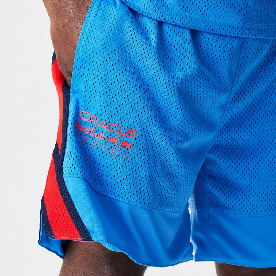 The Male model is wearing Red Bull Racing Basketball Mesh Blue Shorts 3
