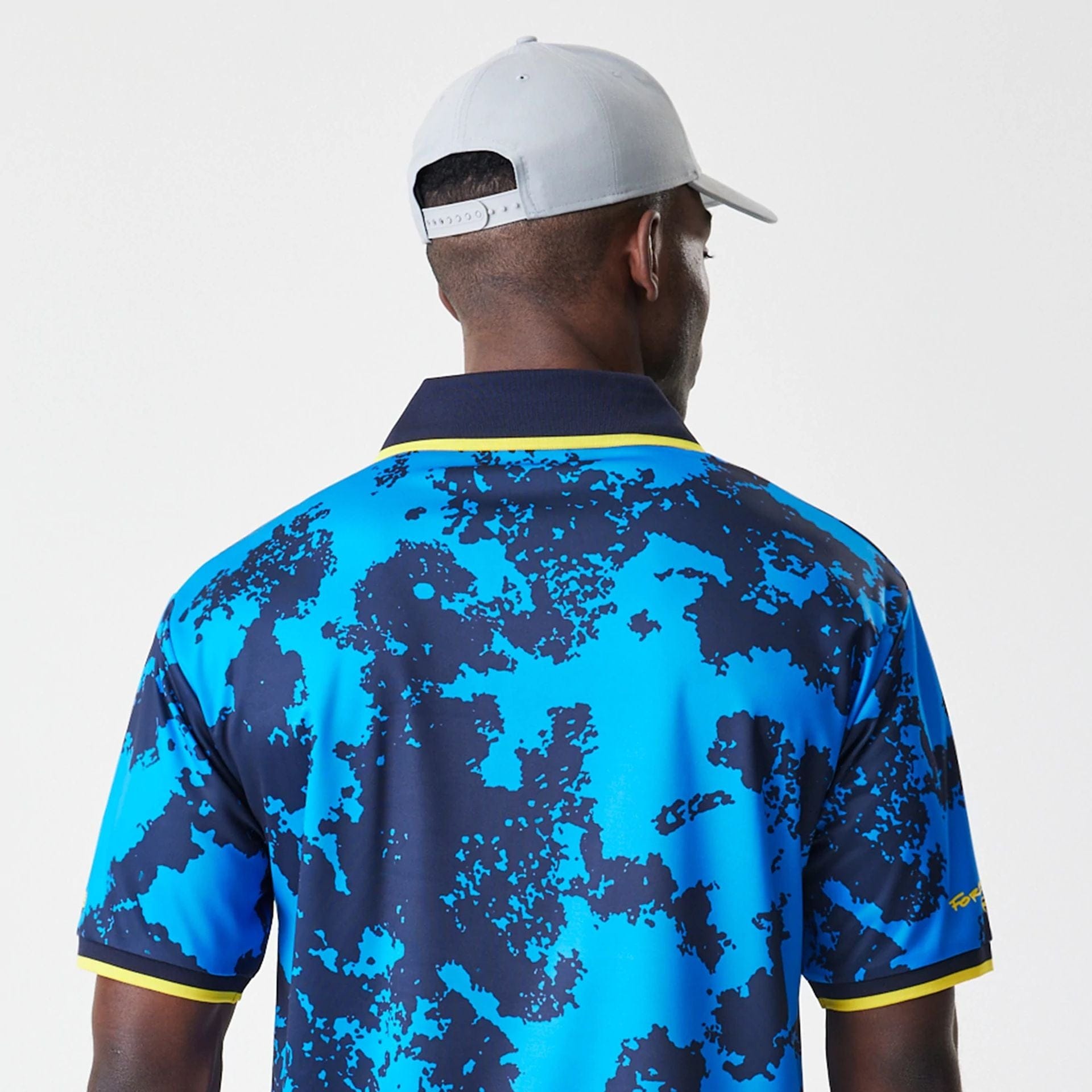 The Male model is wearing Red Bull Racing Graphic Blue Football Jersey 7