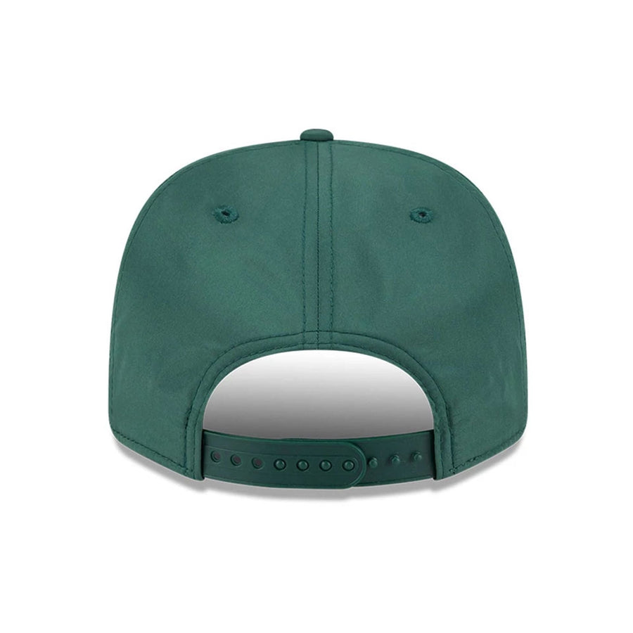 This is a Green Bay Packers NFL Coach Dark Green 9SEVENTY Stretch Snap Adjustable Cap 7
