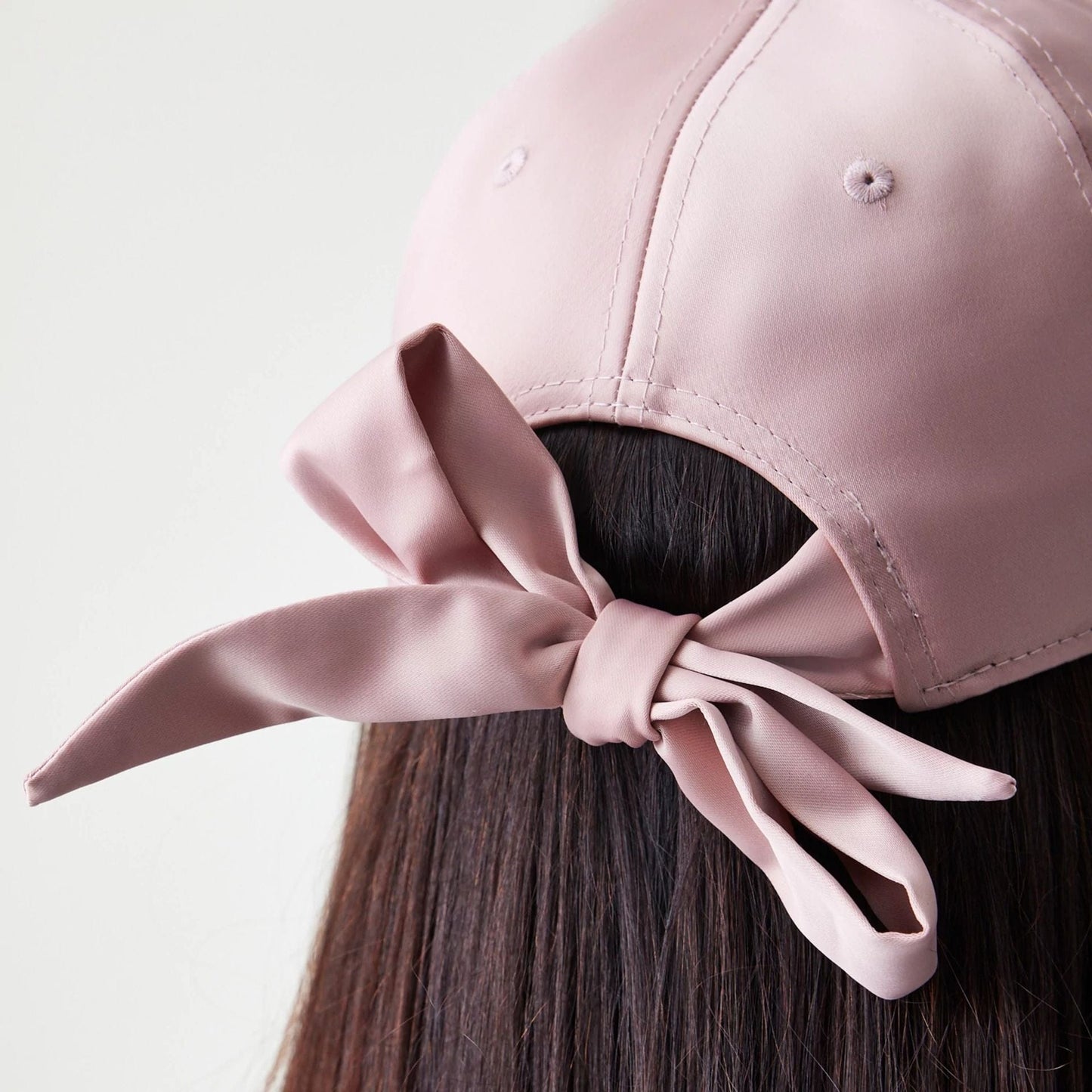 This is a New York Yankees Womens Satin Bow Pastel Pink 9TWENTY Adjustable Cap 8