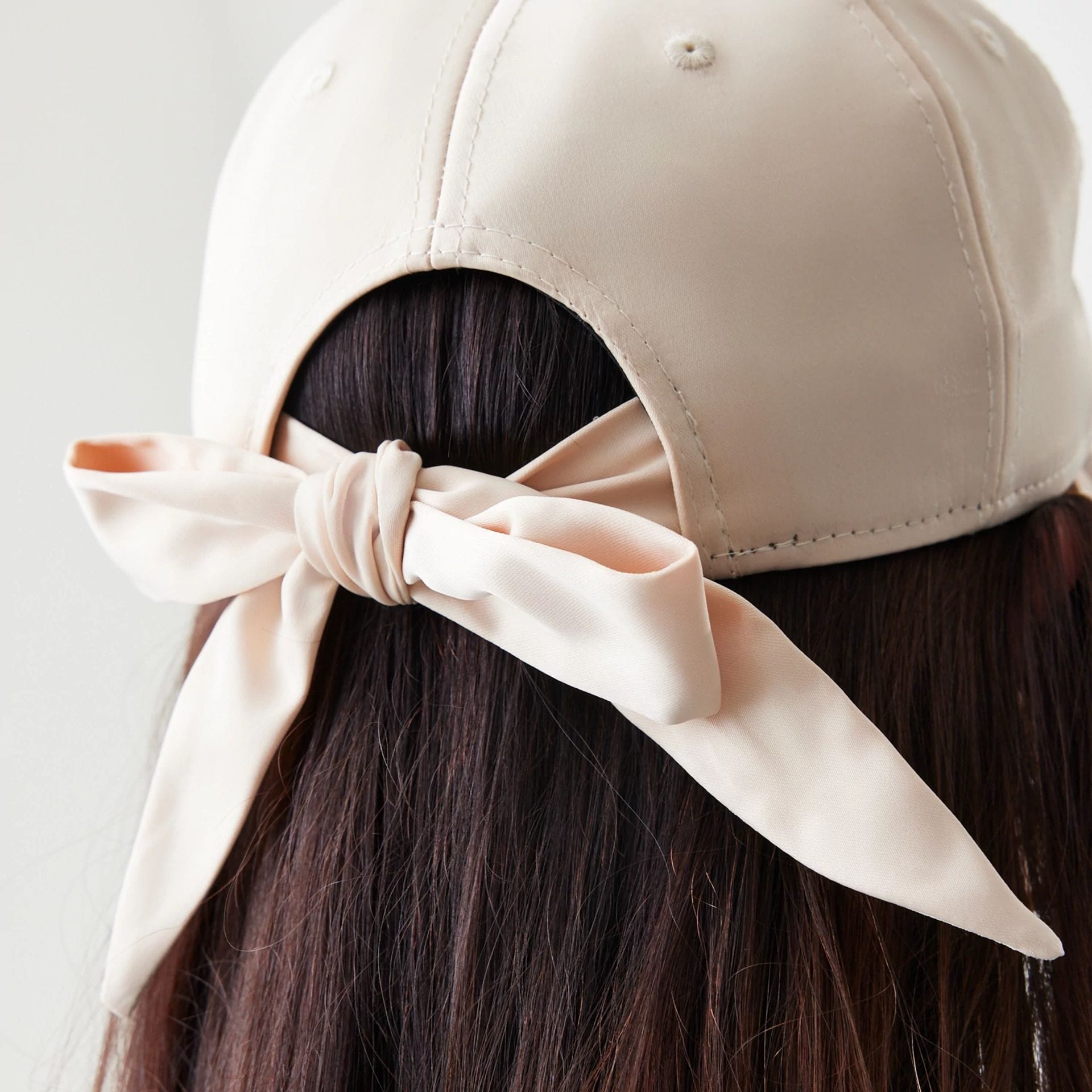 This is a Womens New Era Satin Bow Light Beige 9TWENTY Adjustable Cap 8