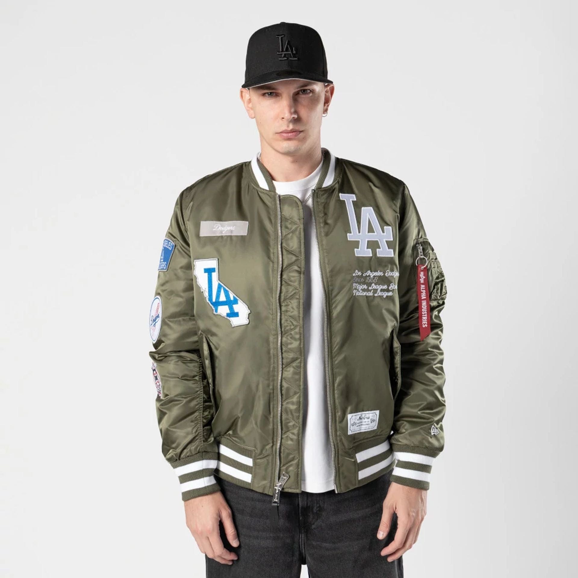 The Male model is wearing LA Dodgers MLB X Alpha Green Bomber Jacket 1