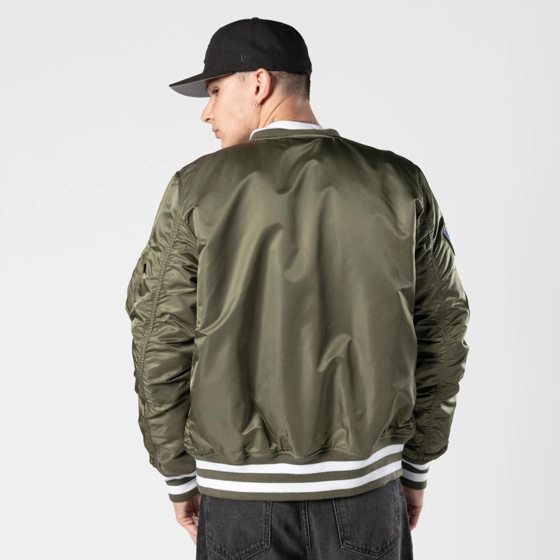 The Male model is wearing LA Dodgers MLB X Alpha Green Bomber Jacket 2