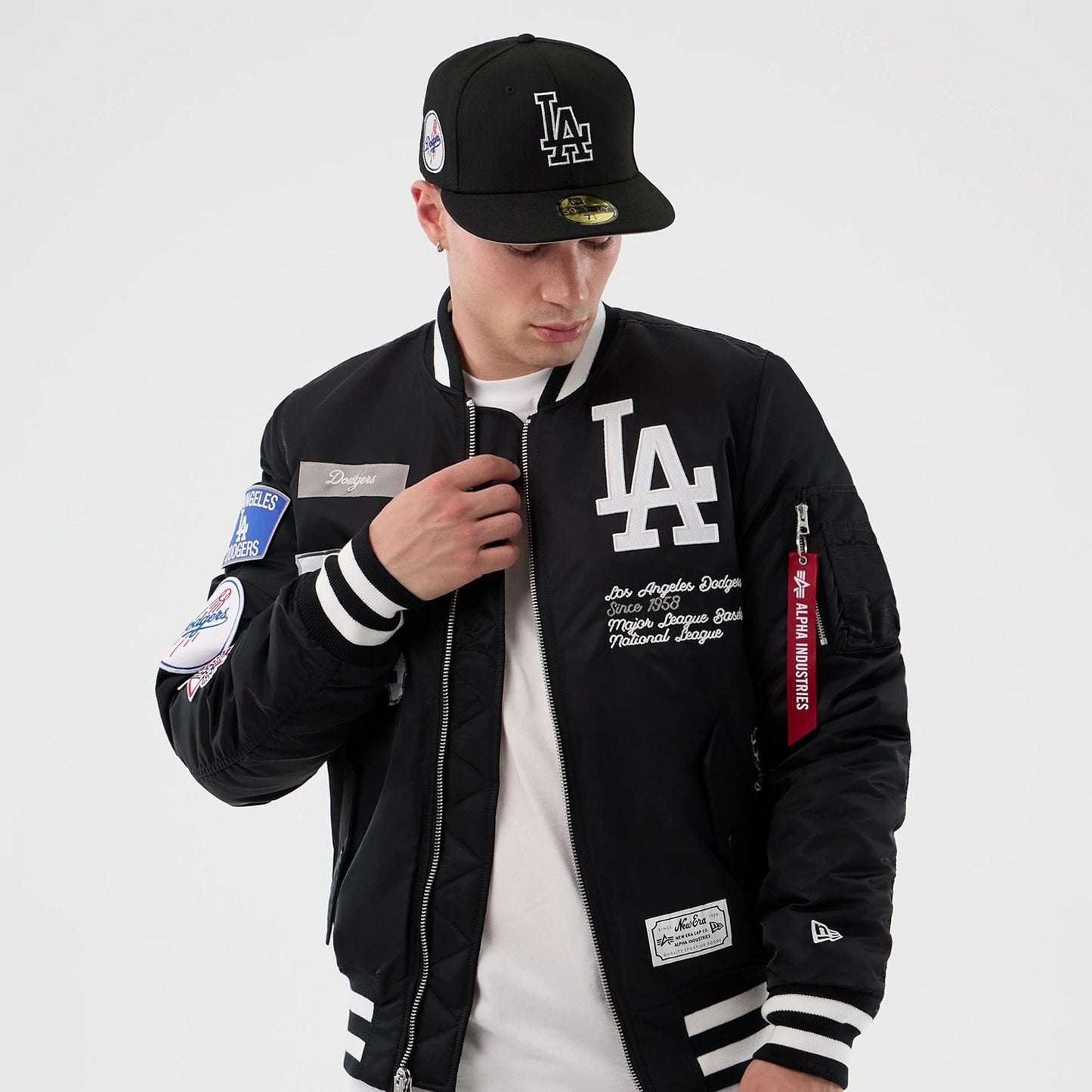 The Male model is wearing LA Dodgers MLB X Alpha Black Bomber Jacket 3