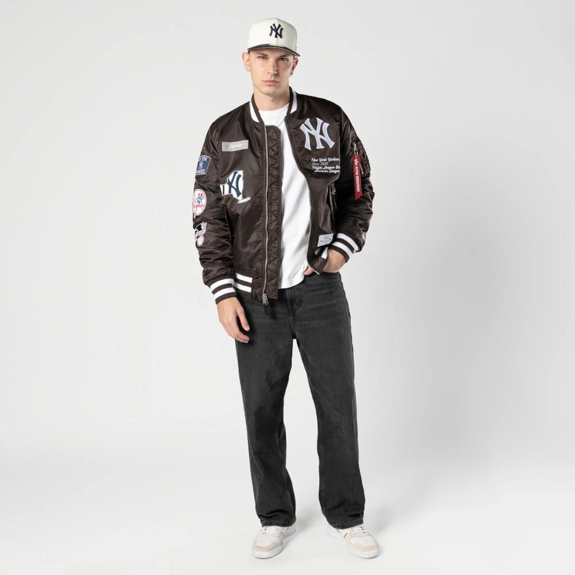 The Male model is wearing New York Yankees MLB X Alpha Dark Brown Bomber Jacket 5