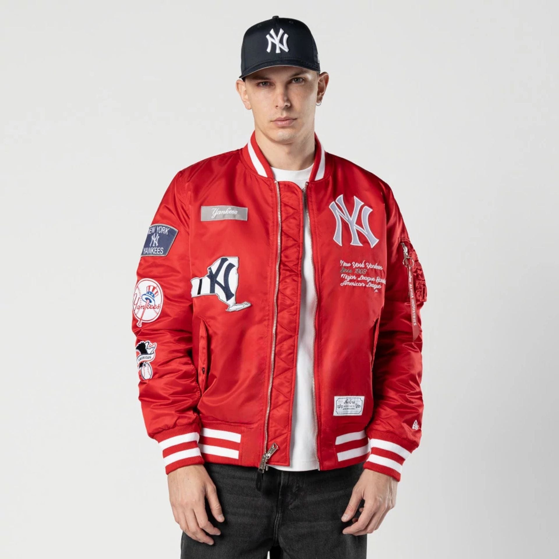 The Male model is wearing New York Yankees MLB X Alpha Red Bomber Jacket 1
