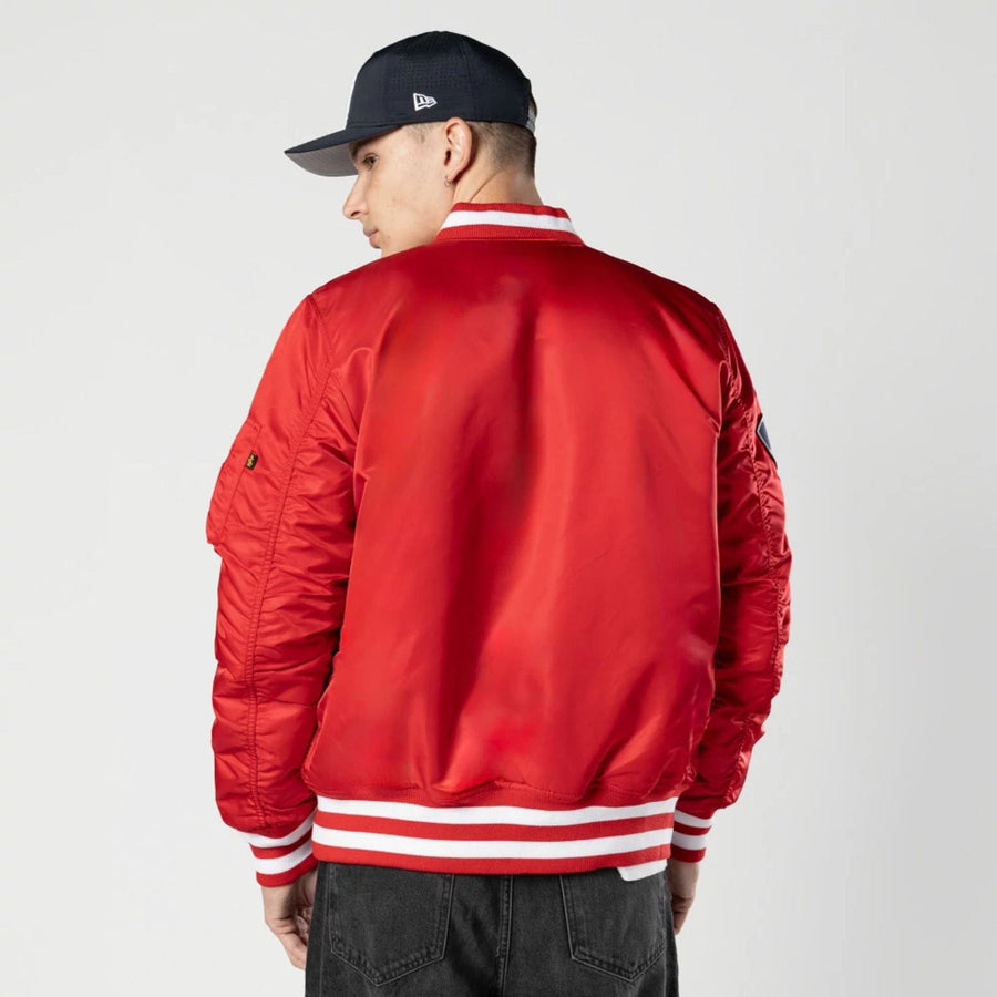 The Male model is wearing New York Yankees MLB X Alpha Red Bomber Jacket 2