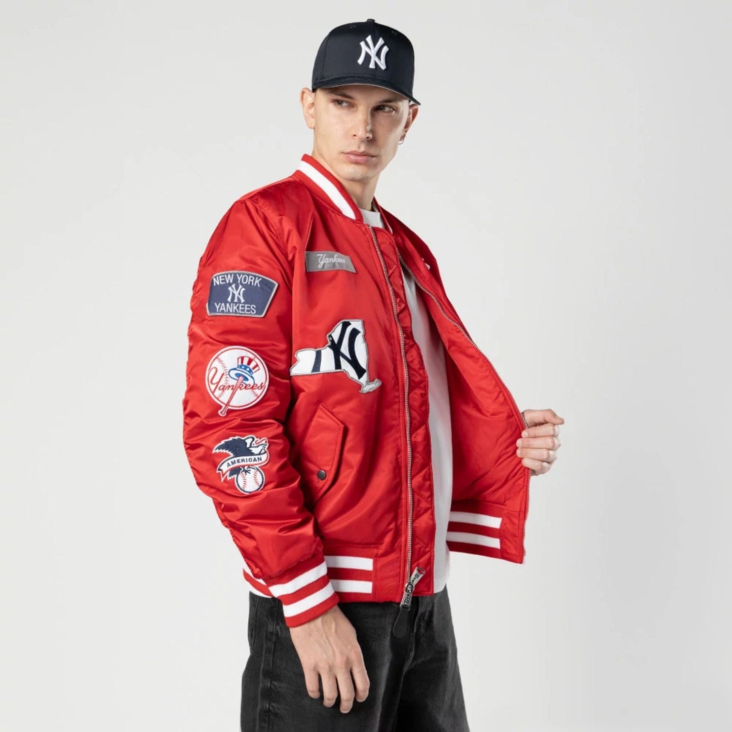 The Male model is wearing New York Yankees MLB X Alpha Red Bomber Jacket 3