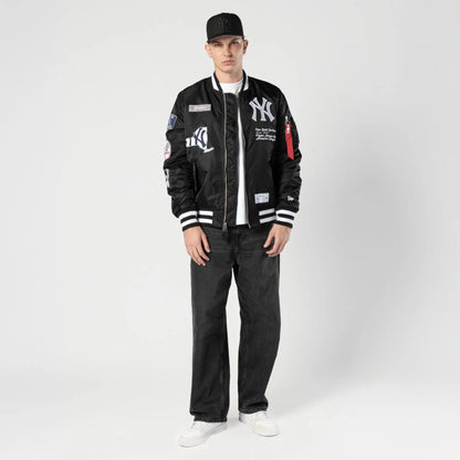 The Male model is wearing New York Yankees MLB X Alpha Black Bomber Jacket 5