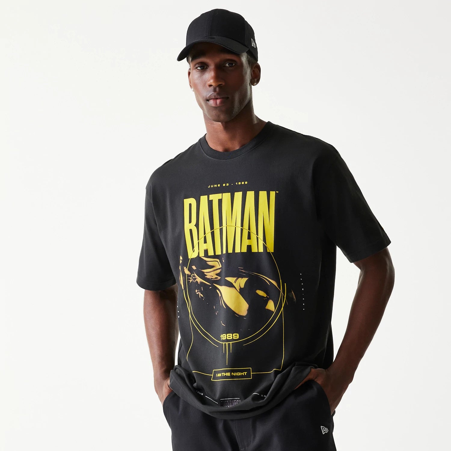 The Male model is wearing Batman Batmobile Black T-Shirt 1