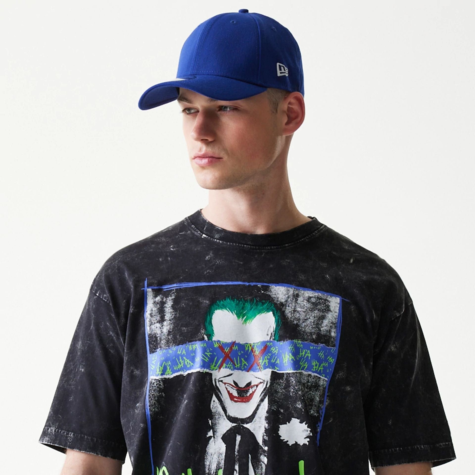 The Male model is wearing Joker Batman Black T-Shirt 6