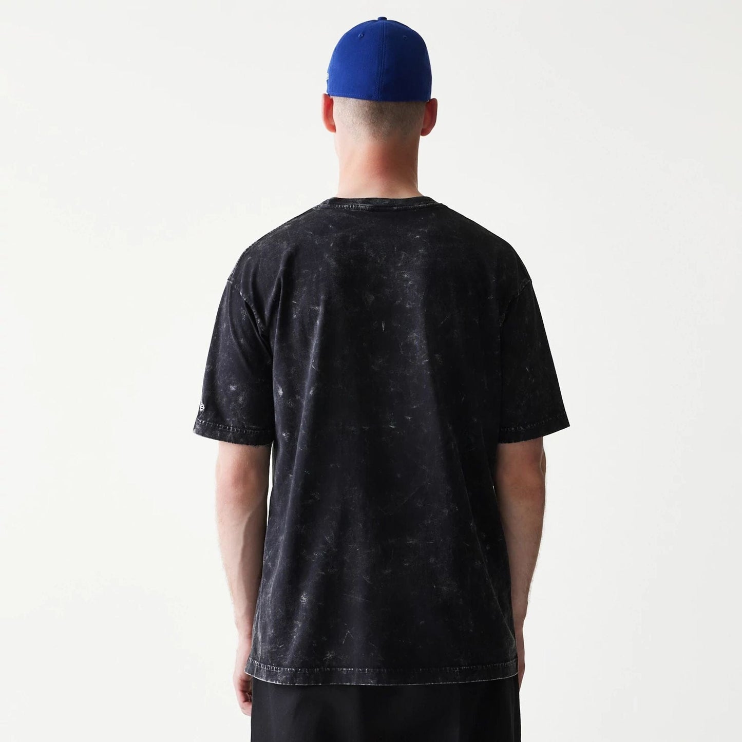 The Male model is wearing Joker Batman Black T-Shirt 2