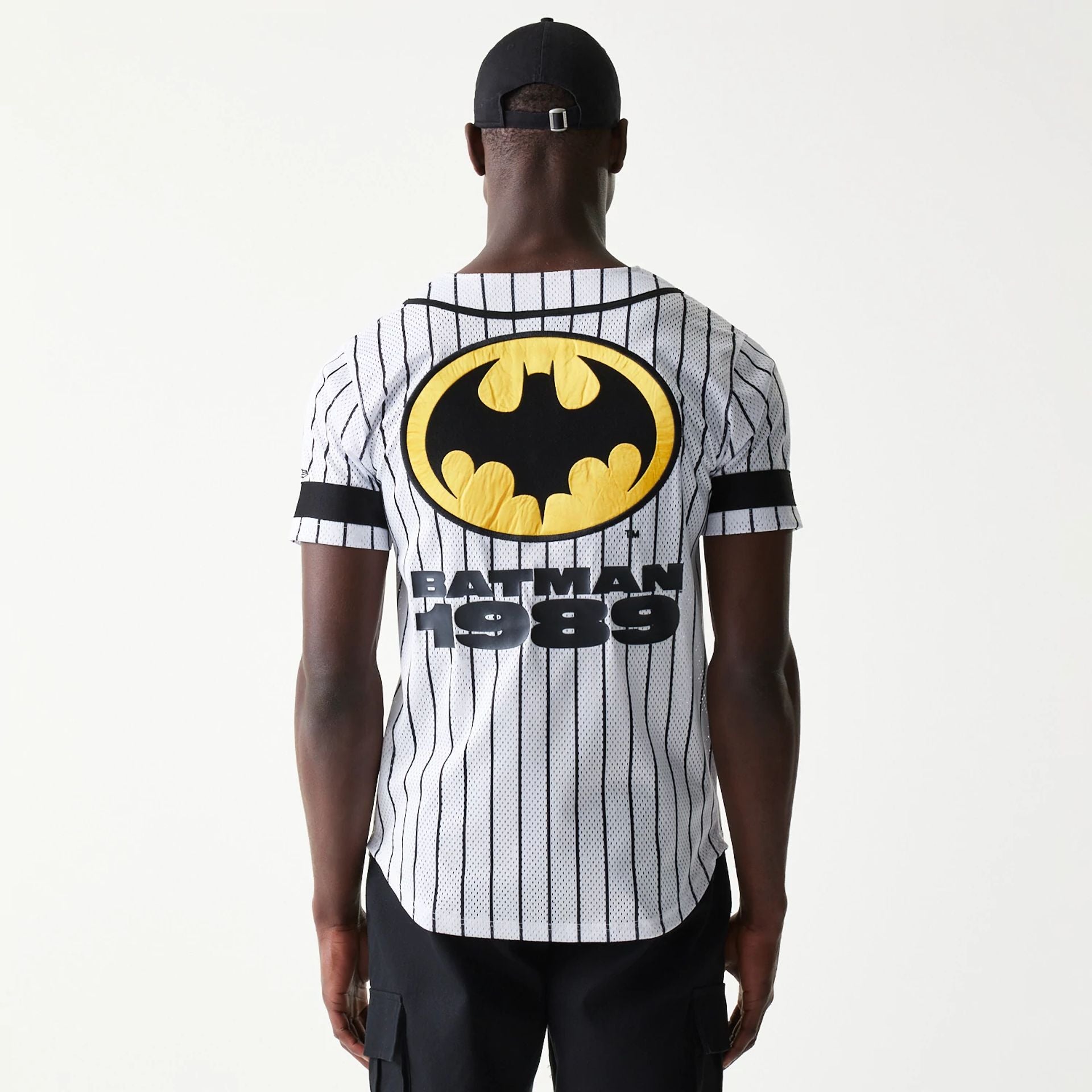 The Male model is wearing Batman Pinstripe White Jersey 2