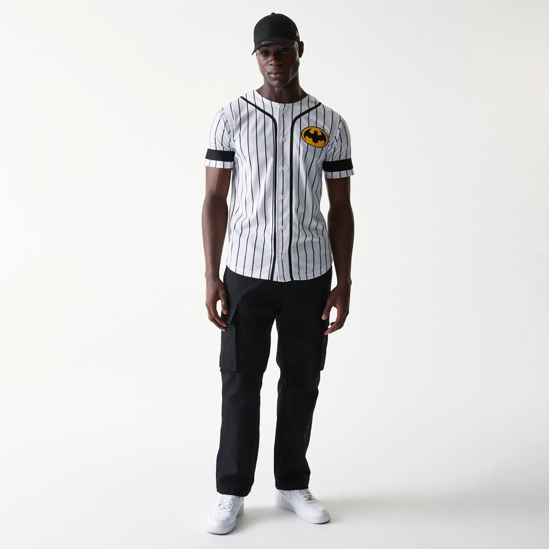 The Male model is wearing Batman Pinstripe White Jersey 8