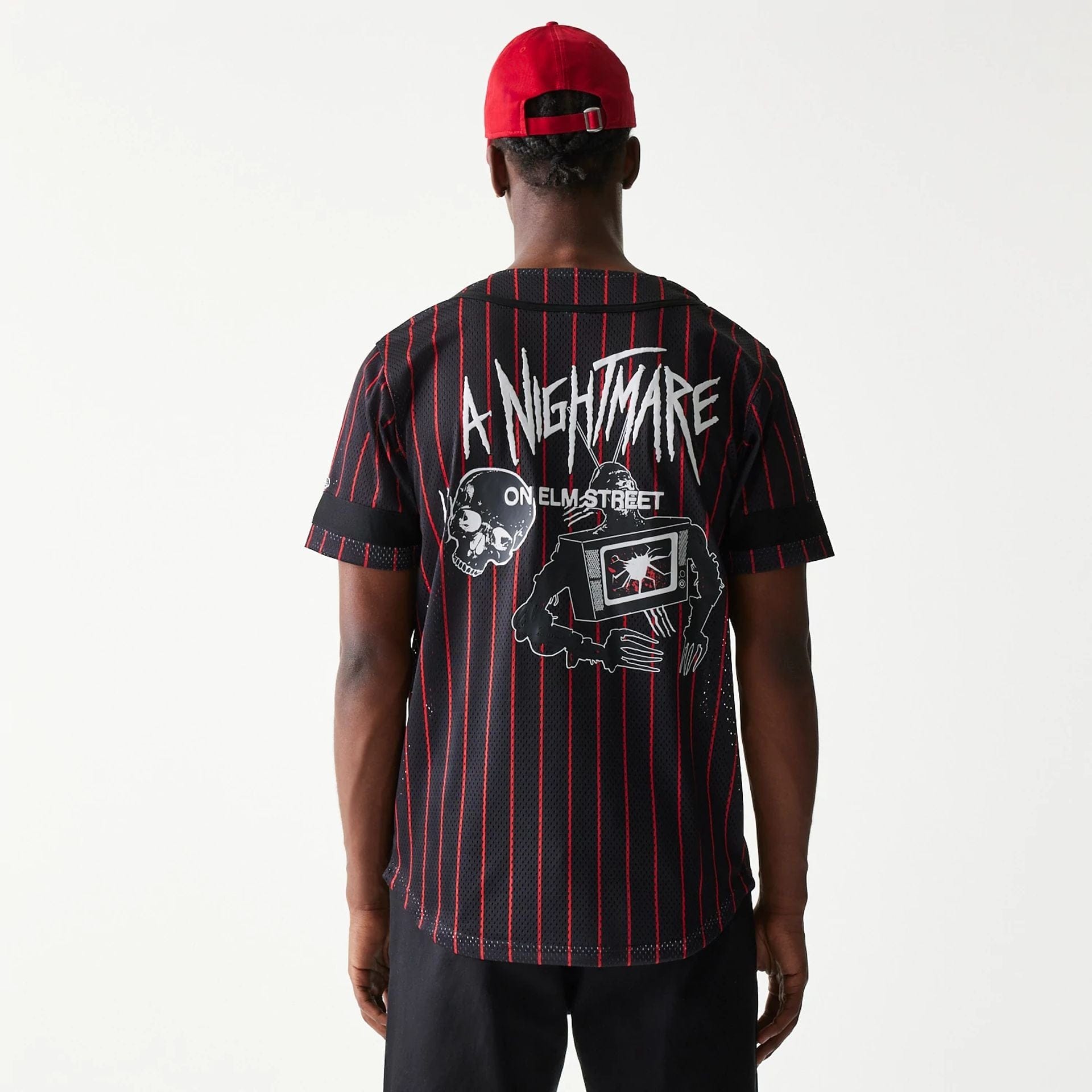 The Male model is wearing A Nightmare On Elm Street Black Jersey 2