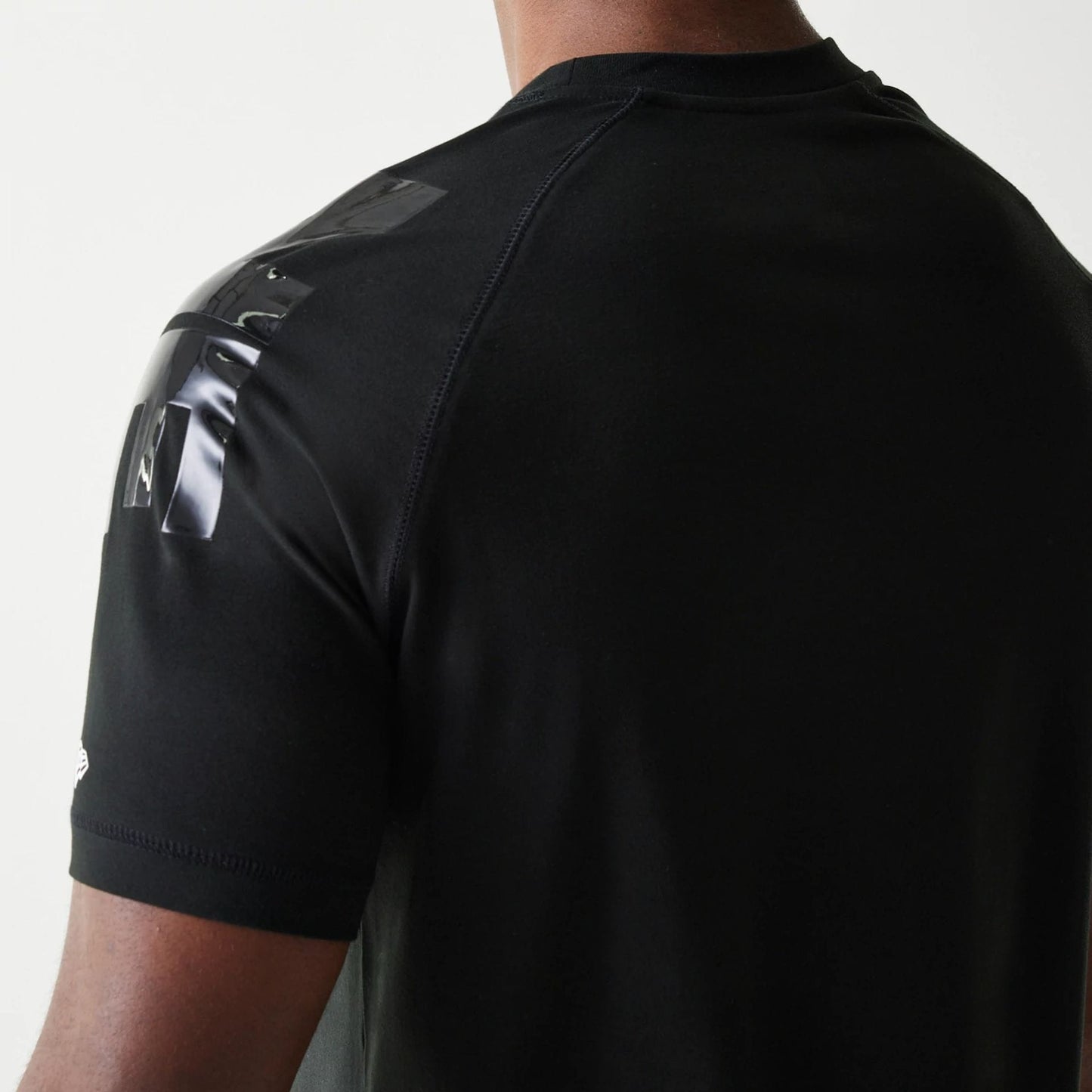 The Male model is wearing New England Patriots NFL 3RD Down Black T-Shirt 5