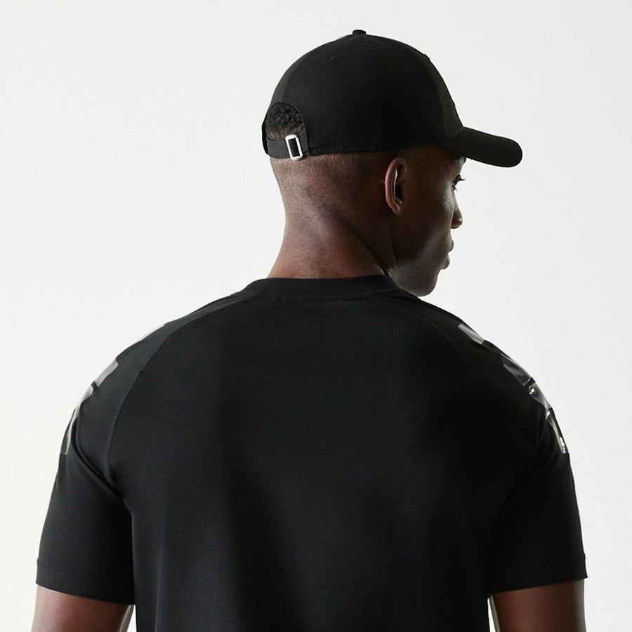 The Male model is wearing New England Patriots NFL 3RD Down Black T-Shirt 6