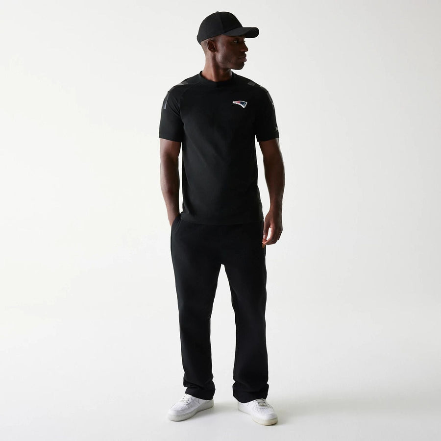 The Male model is wearing New England Patriots NFL 3RD Down Black T-Shirt 8