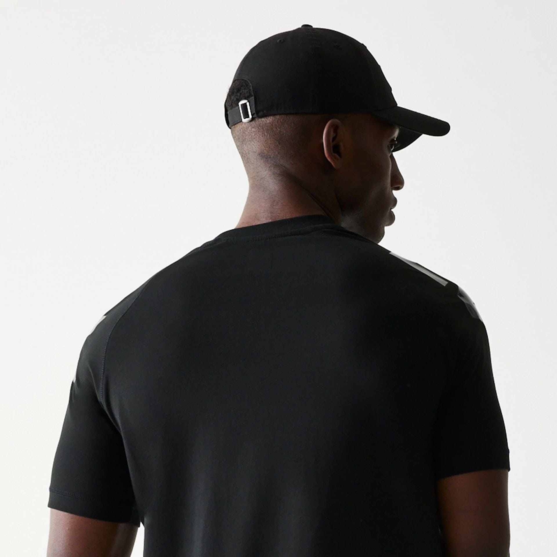 The Male model is wearing Las Vegas Raiders NFL 3RD Down Black T-Shirt 7