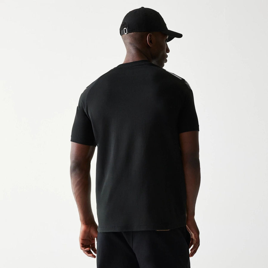 The Male model is wearing Las Vegas Raiders NFL 3RD Down Black T-Shirt 2