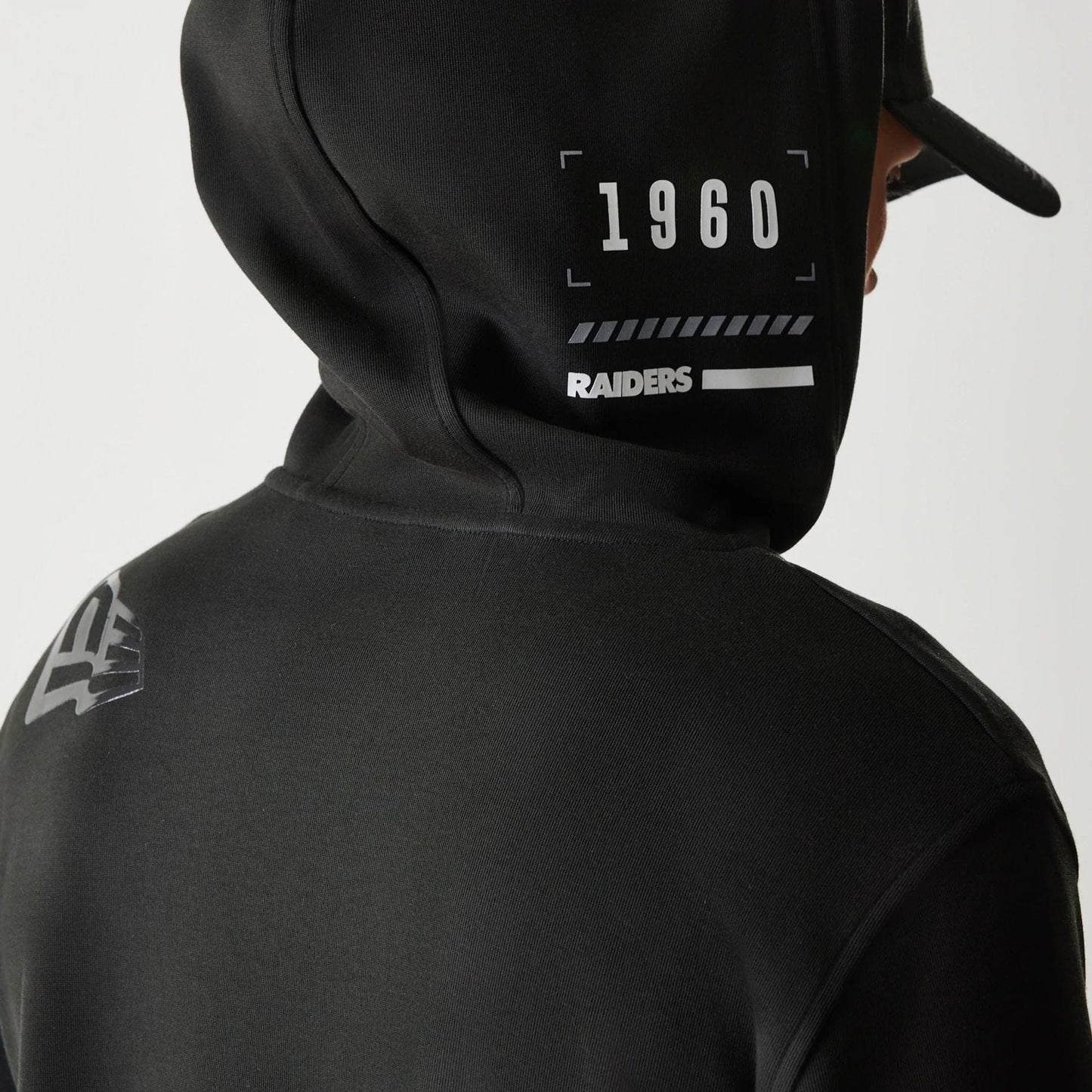 The Male model is wearing Las Vegas Raiders NFL 3RD Down Black Pullover Hoodie 3