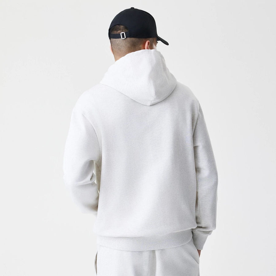 The Male model is wearing New Era Premium Essential Pastel Grey Oversized Full Zip Hoodie 2