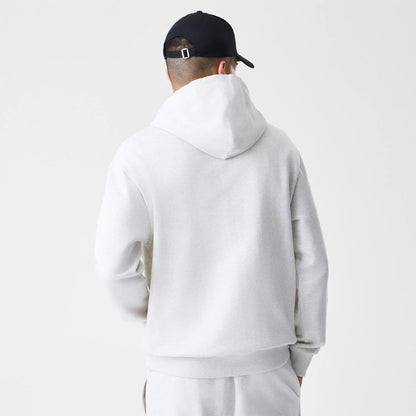 The Male model is wearing New Era Premium Essential Pastel Grey Oversized Full Zip Hoodie 2