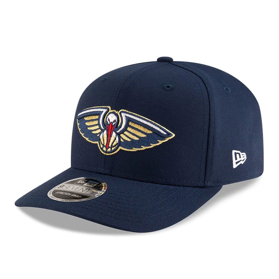 This is a New Orleans Pelicans NBA Team Dark Blue 9SEVENTY Stretch Snap Adjustable Cap 1