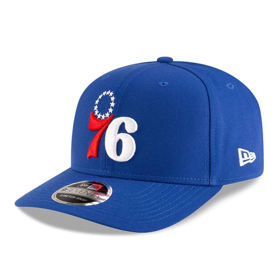 This is a Philadelphia 76ers NBA Team Blue 9SEVENTY Stretch Snap Adjustable Cap 1