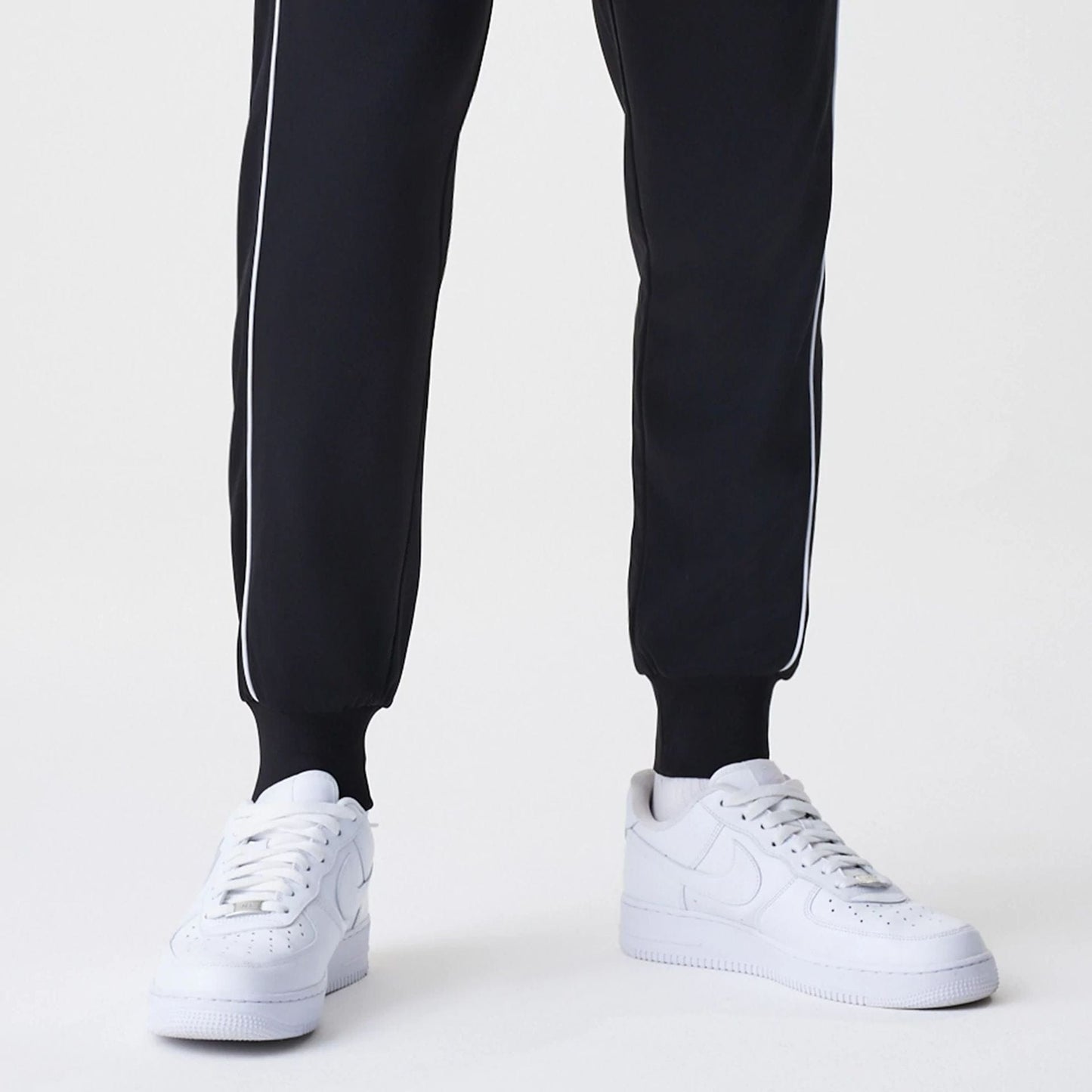The Male model is wearing Chicago Bulls NBA Slim Black Track Pants 6