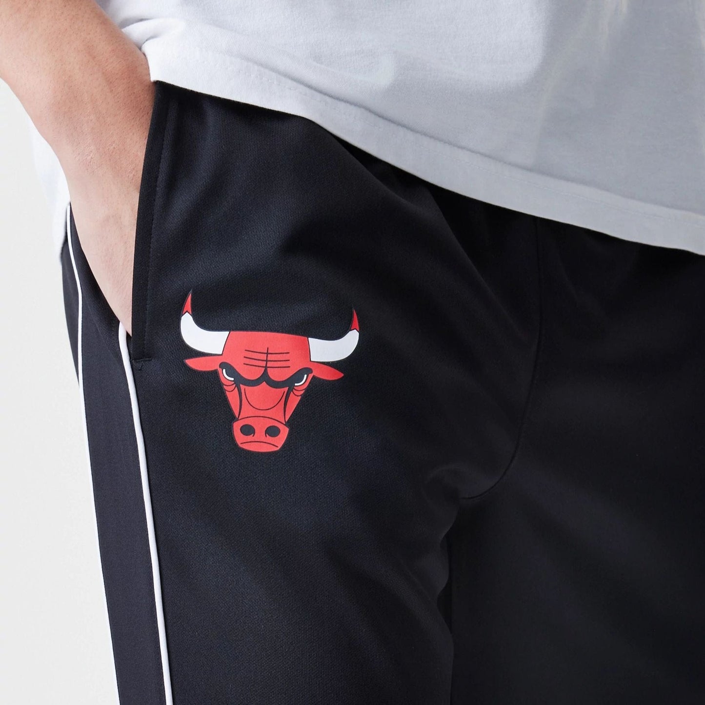 The Male model is wearing Chicago Bulls NBA Slim Black Track Pants 3