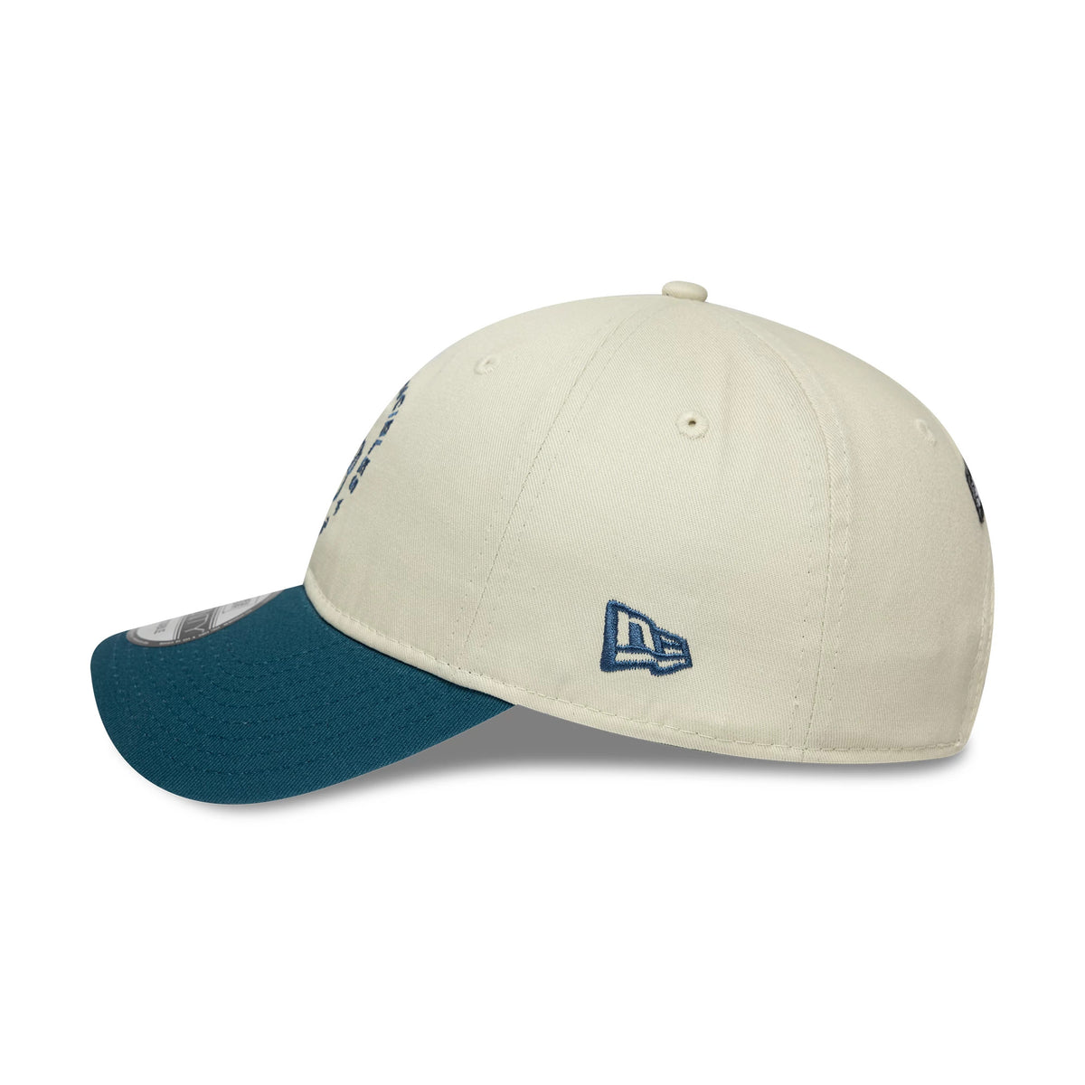 Oval Invincibles The Hundred 2025 Contrast Light Beige New Era 9TWENTY Adjustable Cap, side view with a blue embroidered New Era flag logo, light beige crown, teal curved visor and 9TWENTY size sticker.