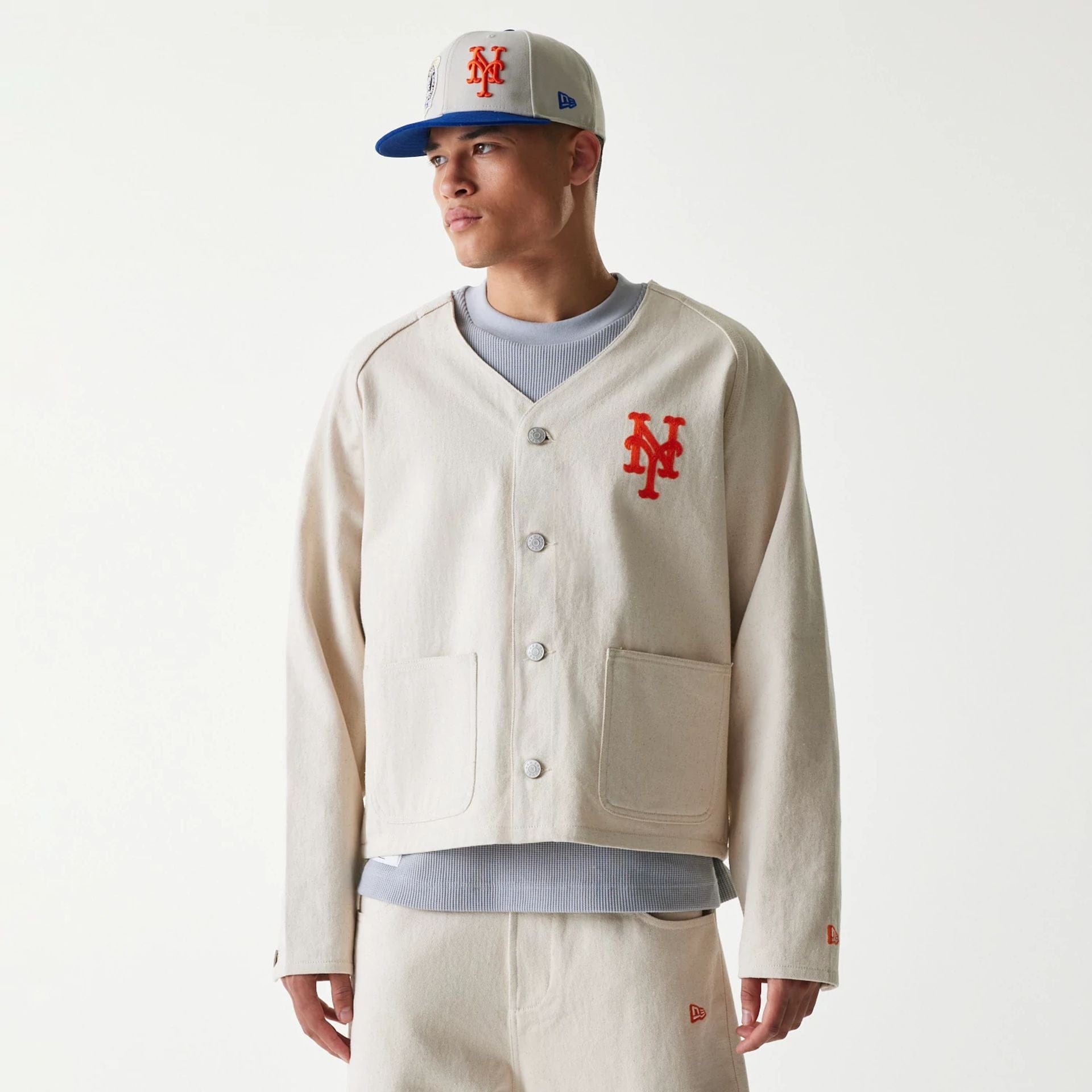 The Male model is wearing New York Mets MLB Cotton Open Cream Jacket 1
