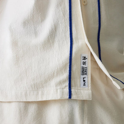 The Male model is wearing New York Mets MLB Piping Open Cream Short Sleeve Shirt 5