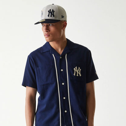 The Male model is wearing New York Yankees MLB Piping Navy Short Sleeve Shirt 3