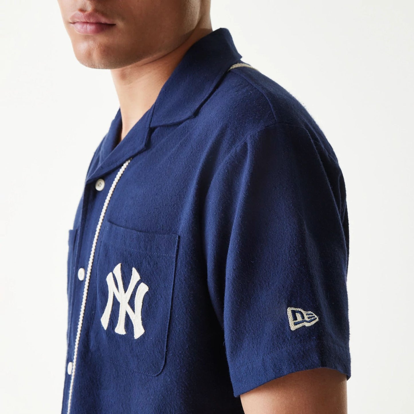 The Male model is wearing New York Yankees MLB Piping Navy Short Sleeve Shirt 4