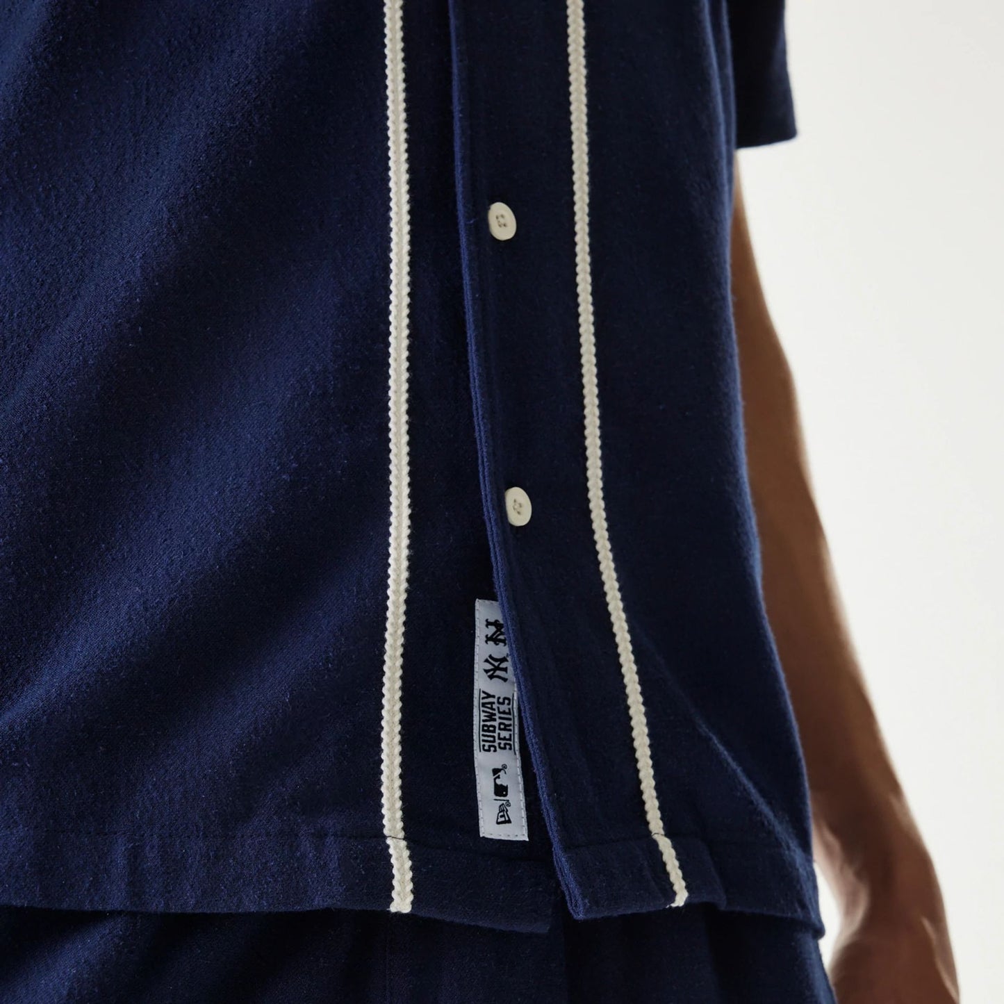 The Male model is wearing New York Yankees MLB Piping Navy Short Sleeve Shirt 5