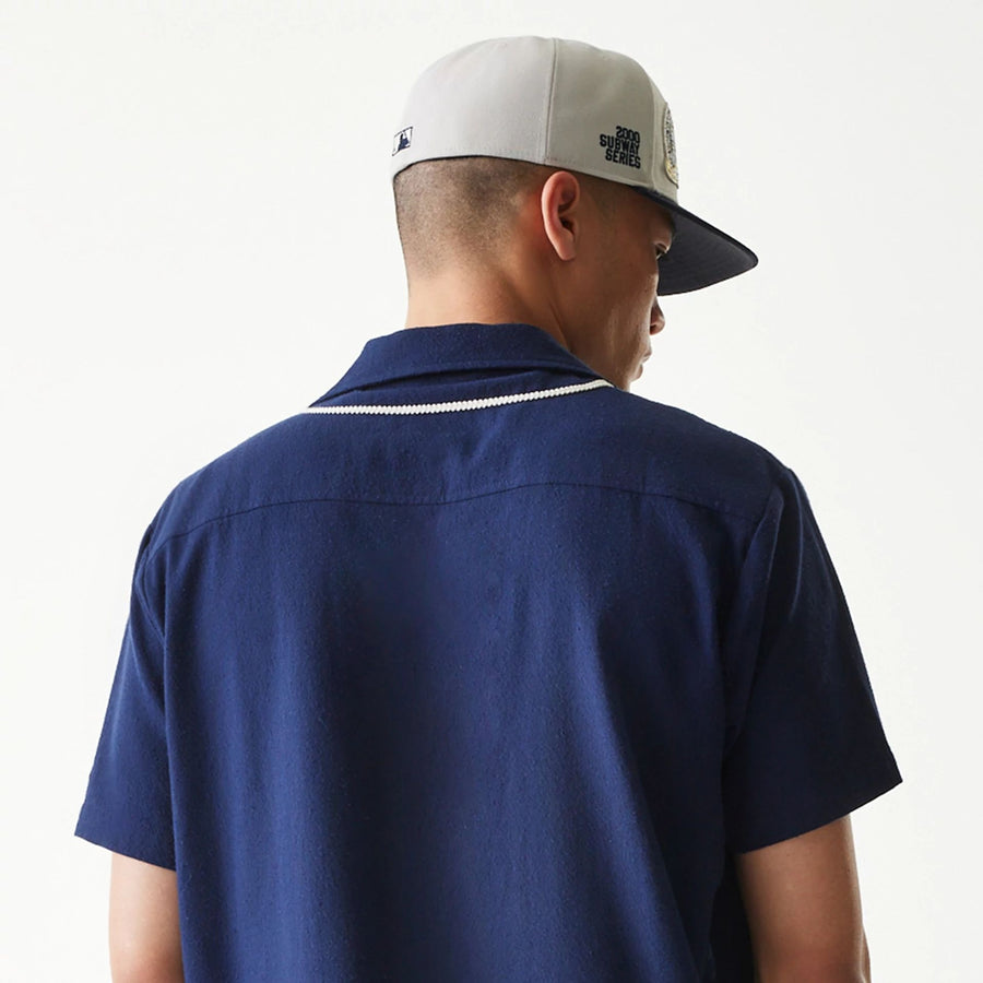 The Male model is wearing New York Yankees MLB Piping Navy Short Sleeve Shirt 7