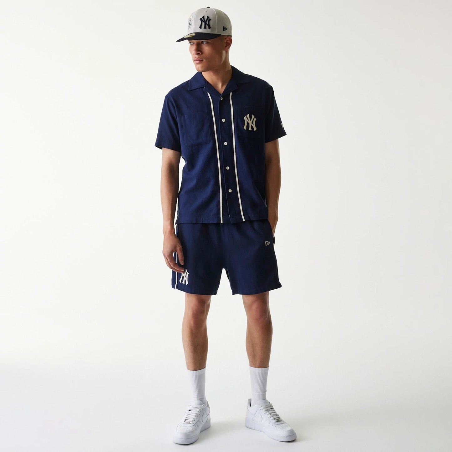 The Male model is wearing New York Yankees MLB Piping Navy Short Sleeve Shirt 8