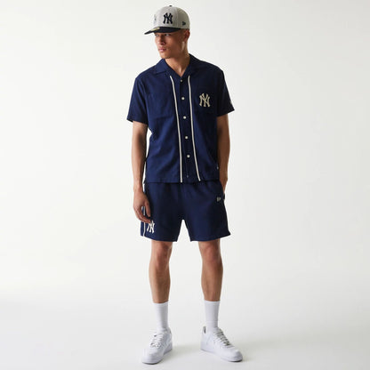 The Male model is wearing New York Yankees MLB Piping Navy Short Sleeve Shirt 8