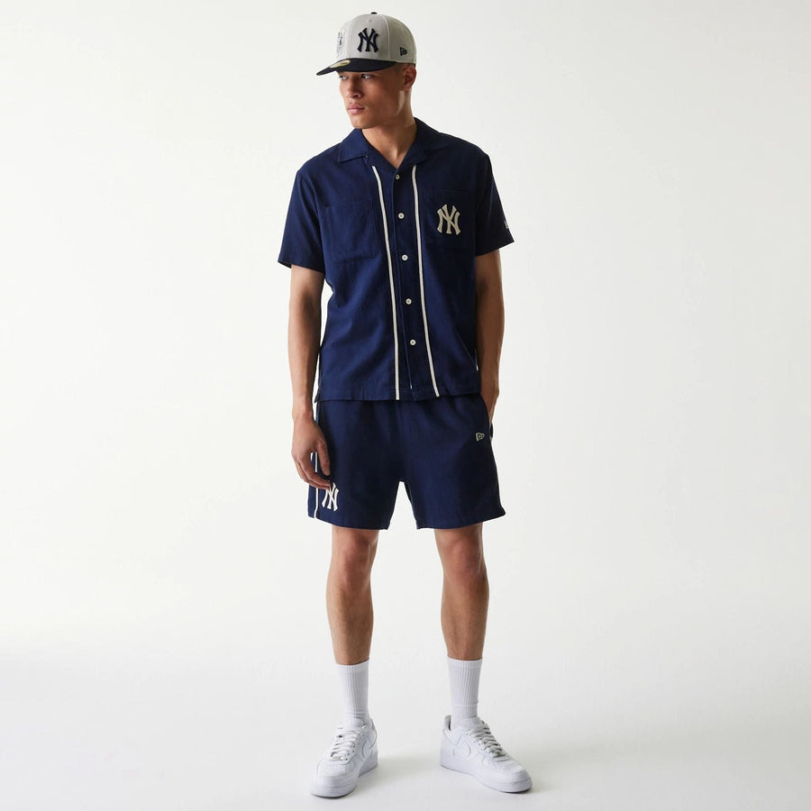 The Male model is wearing New York Yankees MLB Piping Navy Short Sleeve Shirt 8