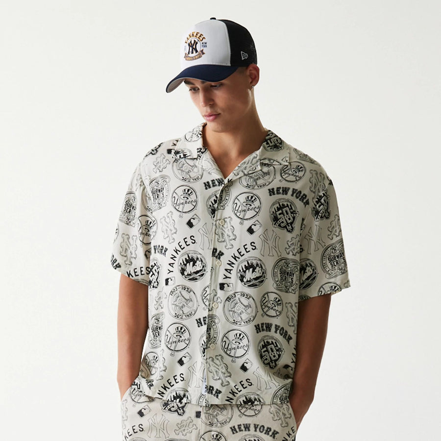 The Male model is wearing MLB Subway Series All Over Print Open White Short Sleeve Shirt 6