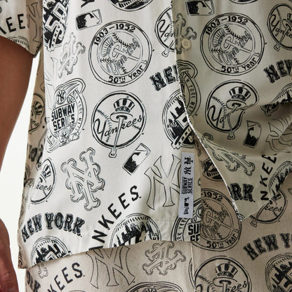 The Male model is wearing MLB Subway Series All Over Print Open White Short Sleeve Shirt 5