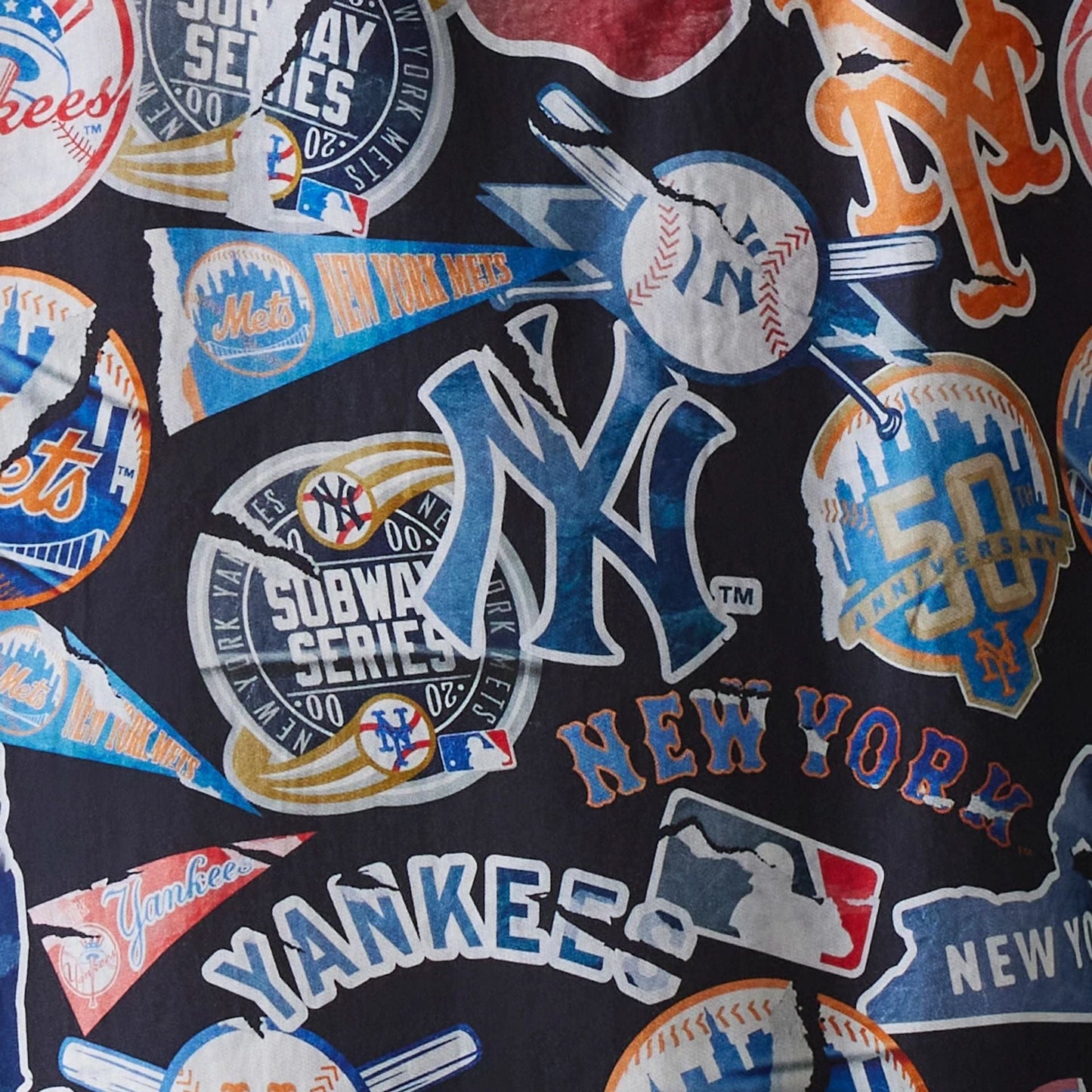 The Male model is wearing MLB Subway Series All Over Print Navy Short Sleeve Shirt 5