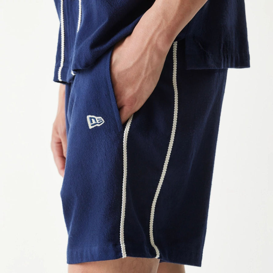 The Male model is wearing New York Yankees MLB Piping Navy Shorts 4