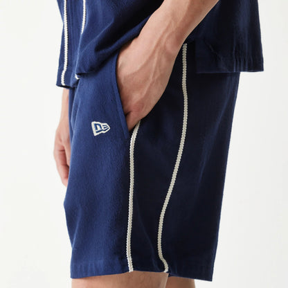 The Male model is wearing New York Yankees MLB Piping Navy Shorts 4