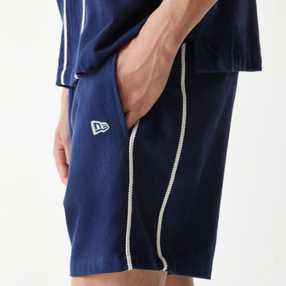 The Male model is wearing New York Yankees MLB Piping Navy Shorts 4